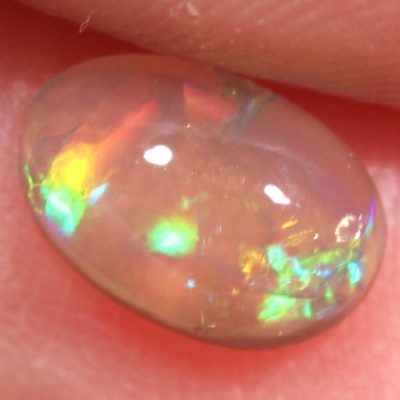 SOLID CRYSTAL OPAL Bright rolling flashes throughout the opal in a 3D pattern